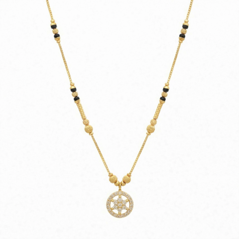 Gold plated mangalsutra necklace with black beads and circular floral crystal studded pendant.