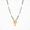 Gold plated mangalsutra necklace with black beads and sunburst circular pendant featuring crystal accents and a ruby center stone.