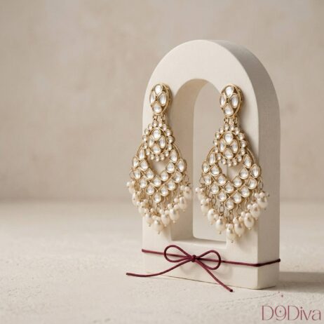 Kundan chandbali earrings with intricate design and beaded drops